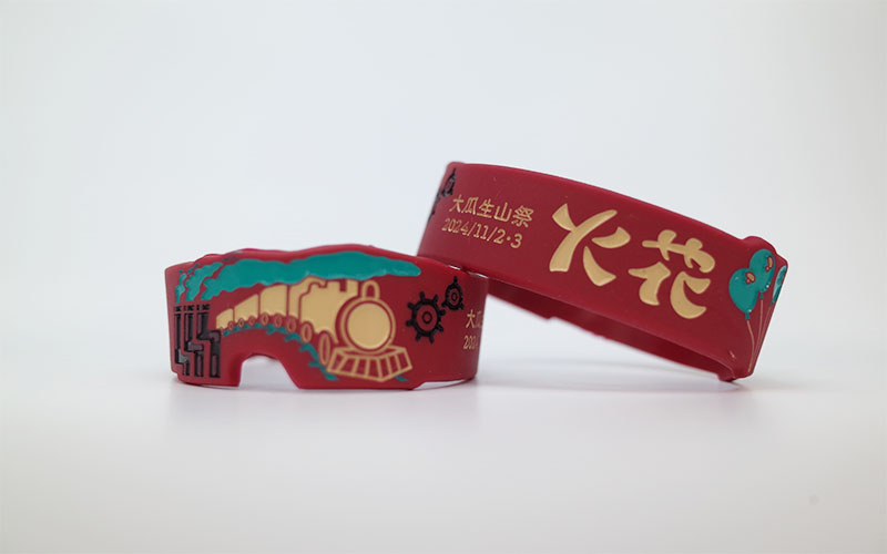 シェイプ型デボス加工シリコンリストバンド・幅25mm・色入れ3色